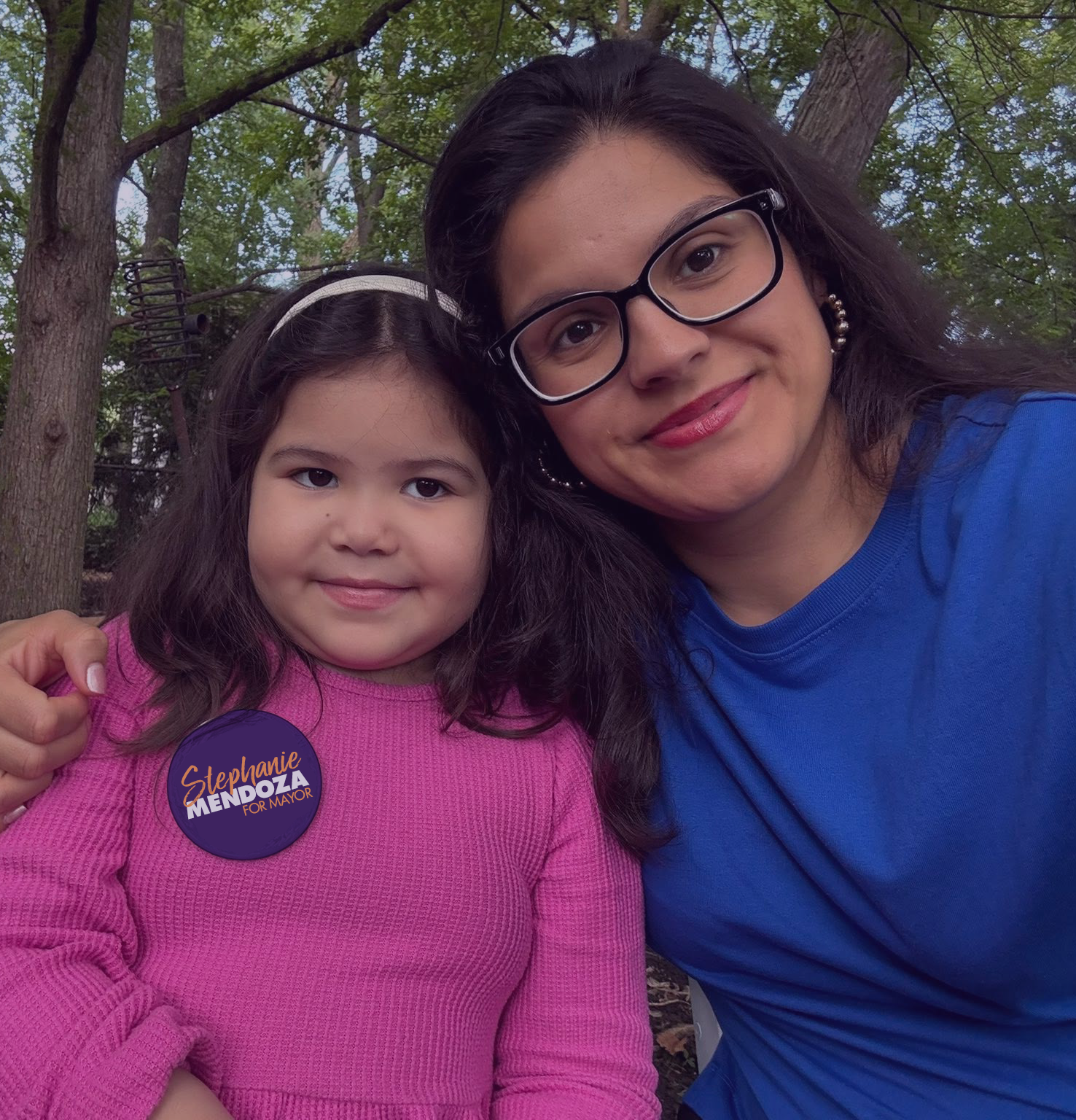 Stephanie Mendoza with her daughter, who wears a Stephanie Mendoza for Mayor button