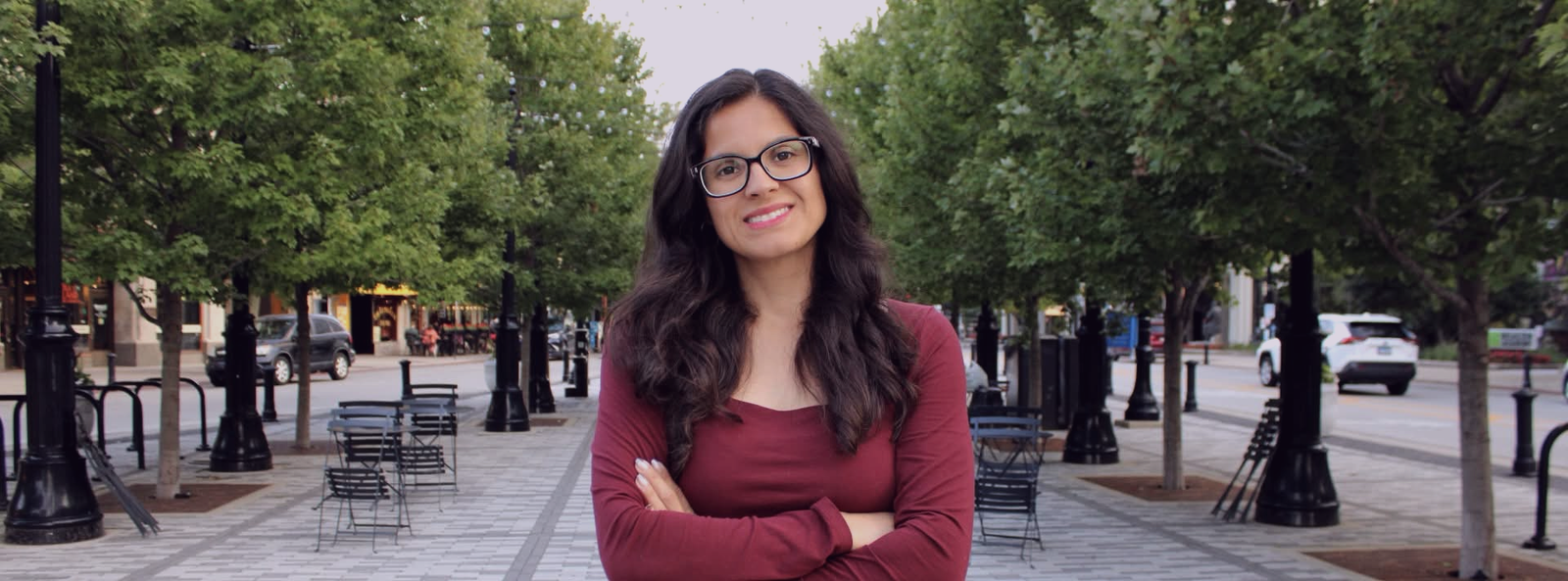 Stephanie Mendoza on a tree-lined Evanston street